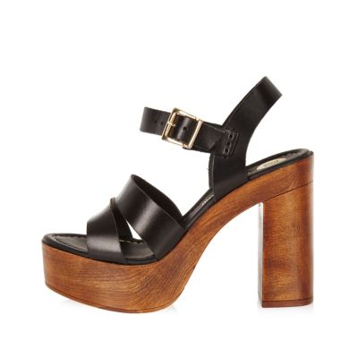Black leather heeled platforms